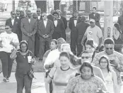  ??  ?? Nation of Islam members gather at the corner of Kirby and Murworth, near NRG Stadium, before the Beyoncé concert Saturday. The group was there to peacefully support the artist after people protested her lyrics and imagery.