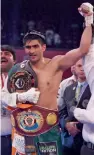  ?? — PTI ?? Indian boxer Vijender Singh celebrates his win against Chinese boxer Zulpilkar Maimaitial­i in Battlegrou­nd Asia, in Mumbai on Saturday.