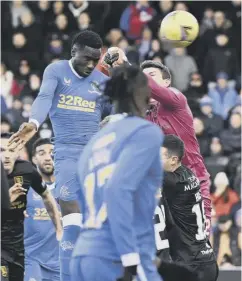  ?? ?? 2 Midfielder Joe Aribo sweeps in Rangers’ second goal after just 16 minutes
3 Fashion Sakala sends a thumping header past Max Stryjek to make it 3-1 to the visitors