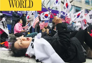  ?? JUNG YEON-JE / AFP / GETTY IMAGES ?? A supporter of South Korea’s former president Park Geun-hye reacts at a rally outside the Seoul Central District Court after Park was sentenced to 24 years in prison on Friday in a high-profile corruption and bribery case.