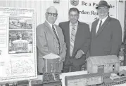  ?? Joan Vogan / For the Chronicle ?? Avid model train enthusiast­s Keith Stratton, left, Jim Mitchell and Craig Cauthen had a display of large-scale trains they are placing in the Rosenberg Railroad Museum.