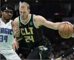  ?? JACOB KUPFERMAN – THE ASSOCIATED PRESS ?? The Clippers acquired veteran center Mason Plumlee, right, from the Hornets on Thursday. The 7-footer is averaging 12.3 points, 9.6 rebounds and 3.7 assists this season.