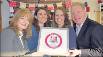  ??  ?? The Sewing Cafe’s Becky and Fay are given the award for Top of the Shops 2016 by Martina Payne of Hinckley BID (left) and Bill Cullen who will be the Chief Executive of Hinckley and Bosworth Borough Council in the new year