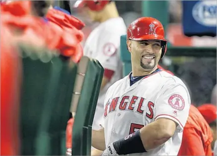 ?? Robert Gauthier Los Angeles Times ?? ONLY EIGHT major league players have hit 600 home runs, and Albert Pujols stands on the doorstep of becoming the ninth after hitting his 599th on Tuesday. At 37 and with 41⁄2 years left on his Angels contract, he has a chance to become the fourth to...