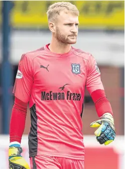  ?? Picture: SNS. ?? Although things went sour for Scott Bain at Dens Park, he impressed during his time between the sticks.