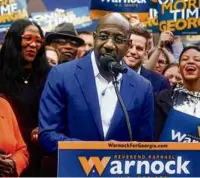  ?? BRYNN ANDERSON/ASSOCIATED PRESS ?? The extended Senate campaign in Georgia between the Democratic incumbent, Raphael Warnock (left), and his Republican challenger, Herschel Walker, will end in a Dec. 6 runoff.