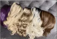  ??  ?? K & Em Wigs offers hair addition services for individual­s suffering from cancer, alopecia or hair loss.