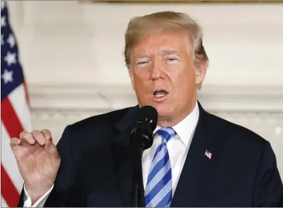  ?? AP PHOTO ?? U.S. President Donald Trump delivers a statement on the Iran nuclear deal from the Diplomatic Reception Room of the White House.