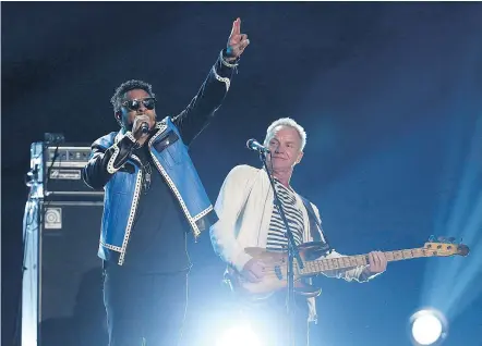  ?? — AP FILES ?? Shaggy, left, and Sting pair up at the Grammy Awards in New York on Jan. 28. Both were surprised Lorde, the only female nominee for album of the year, wasn’t asked to perform solo.