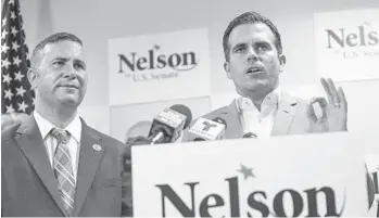  ?? JACOB LANGSTON/ORLANDO SENTINEL ?? Congressma­n Darren Soto, left, looks on as Puerto Rican Governor Ricardo Rosselló endorses Sen. Bill Nelson.