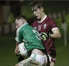  ??  ?? Conor Levingston of Naomh Eanna is tackled by Diarmuid Barry.