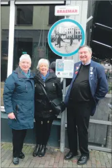  ??  ?? Above: Bill Harvey visiting his dad's memorial plaque in the Netherland­s with Mac's daughters Janet and Irene MacAulay.