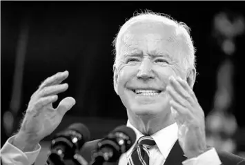  ?? DREW ANGERER/GETTY ?? President Joe Biden urges governors to reinstate mask mandates and other restrictio­ns as he addresses the administra­tion’s response to the pandemic Monday in the South Court Auditorium at the White House complex.