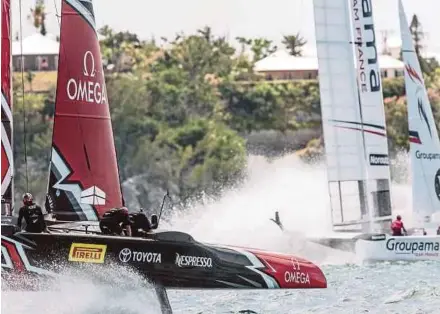  ?? AP PIC ?? Emirates Team New Zealand (left) sails alongside Groupama Team France during a practice race for the America’s Cup on Tuesday.