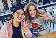  ?? Courtesy of Pittsburgh Artistic Swimming ?? Rachel Xu, left, and Ava Arnold attend USA Artistic Swimming’s Rising Star Camp at The Ohio State University in October.