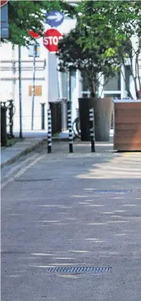  ?? PHOTO: GARETH CHANEY/COLLINS ?? Freedom of the city: A man wearing a face mask walks along a quiet Suffolk Street in Dublin’s city centre.