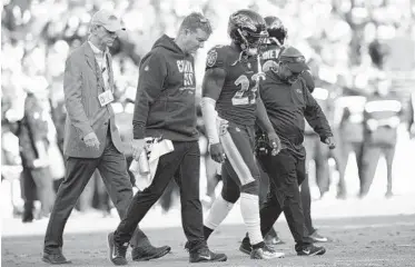  ?? NICK WASS/ASSOCIATED PRESS ?? Ravens safety Tony Jefferson is helped from the field after injuring his ankle Nov. 25 against the Raiders.