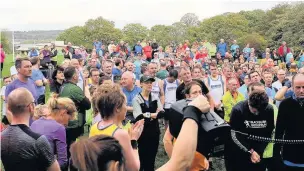  ??  ?? Some of the 300 people who took part in Hyndburn’s first ever ‘parkrun’