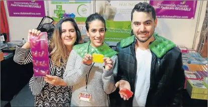  ?? Picture: BARBARA HOLLANDS ?? HEALING TOUCH: Yael Tamsut, Eden Brodie and Adam Brodie show off the Click Me heat pads at the Your Home Expo at the BKB building. The pads are activated with a click of a button and warm aching muscles