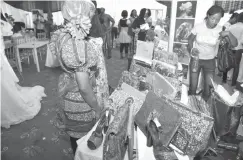  ??  ?? Women entreprene­urs display their wares at an exhibition