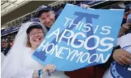  ??  ?? Clockwise, from top: A small crowd of 13,583 had reason to be in full voice; newlyweds Kelly Anne and Lauren Roberts honeymoone­d at BMO Field; receiver Jeff Fuller dropped a potential TD pass in a rare Argos miss.