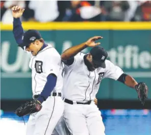  ??  ?? Don Kelly, left, and Torii Hunter of the Detroit Tigers celebrate their 7-3 victory over the Boston Red Sox in Game 4 of the ALCS onWednesda­y. Ronald Martinez, Getty Images