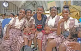  ??  ?? Say Cheese! Author, Activist and Founder of #1000Blackg­irlbooks, Marley Dias smiles for the camera as she interacts with students at the Invest In Girls Summit held at St. James High in partnershi­p with Herflow Foundation on April 15, 2019.