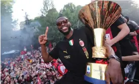  ?? Photograph: AC Milan/Getty Images ?? Fikayo Tomori with the Serie A trophy on Milan’s victory parade – ‘It was like nothing I’ve ever seen before’.