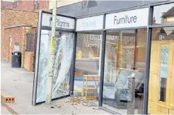  ?? ?? The Pilgrims Hospice furniture shop was badly damaged