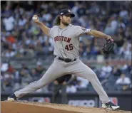  ?? FRANK FRANKLIN II - THE ASSOCIATED PRESS ?? Houston Astros starting pitcher Gerrit Cole (45) delivers against the New York Yankees during the first inning of Game 3 of the American League Championsh­ip Series, Tuesday, Oct. 15, 2019, in New York.