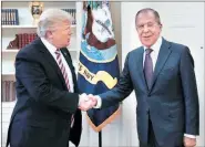  ?? AP ?? Donald Trump greets Russian Foreign Minister Sergey Lavrov at the White House on Wednesday.