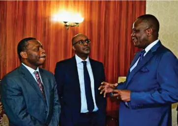  ??  ?? Former Finance Minister Honorable Felix Mutati speaks to IMF Director for Africa Region Dr Abebe Selasie (Middle) and IMF Mission Chief for Zambia Dr. Boileau Loko.