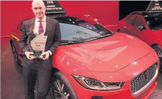  ?? RICK MCGINNIS PHOTOS FOR THE TORONTO STAR ?? Bottom: John Lindo, public relations manager for Jaguar Land Rover Canada, with the Jaguar I-Pace.