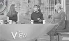  ?? PAULA LOBO/ ABC ?? “The View” co- host Sunny Hostin, center, with Chelsea Clinton, left, and Meghan McCain.