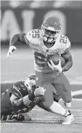  ?? JEFFREY T. BARNES/AP ?? Chiefs running back Clyde Edwards-Helaire carries against the Bills on Monday in Orchard Park, N.Y. Edwards-Helaire finished the game with 161 yards on 26 carries.