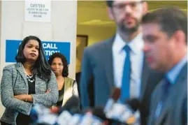  ?? JOSE M. OSORIO/CHICAGO TRIBUNE ?? Cook County State’s Attorney Kim Foxx, left, listens as attorney Joshua Tepfer speaks about the move to vacate and dismiss drug charges against 18 men at the Leighton Criminal Court Building in Chicago on Sept. 24, 2018. Crime was the No. 1 issue in the March 19 Democratic primary for Cook County state’s attorney, one expert said.