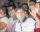  ?? AFP ?? Philippine presidenti­al candidate Ferdinand Marcos Jr waves after casting his vote in Batac, Ilocos Norte on Monday.