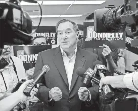  ?? DON KNIGHT/AP ?? Americans for Prosperity advertisin­g targets Sen. Joe Donnelly, D-Ind. Donald Trump took Indiana in the presidenti­al election.