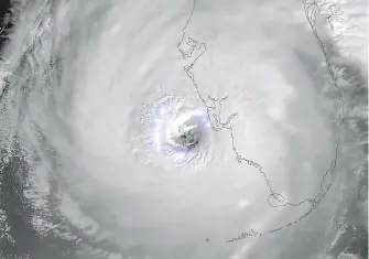  ?? AFP ?? El ojo del huracán categoría 4 antes de entrar a Florida, en imagen de satélite