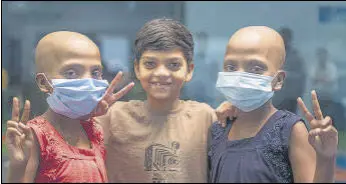  ?? SATISH BATE/HT PHOTO ?? Twins Swarali and Swaranjali Jadhav (12) with their brother Raj (9) who donated his bone marrow that cured the two girls of blood disorder thalassemi­a.