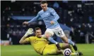  ?? Photograph: Clive Brunskill/AFP/Getty Images ?? Alex McCarthy was adjudged to have not fouled Phil Foden.