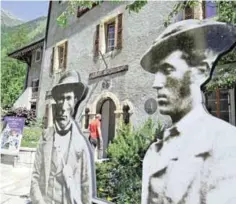  ??  ?? A picture shows signs representi­ng past mountain guides in front of the house of mountain guides in ChamonixMo­nt-Blanc, French Alps.