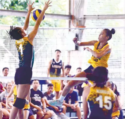  ?? SUNSTAR FOTO / RICHIEL CHAVEZ ?? IN YOUR FACE. USPF’s Mitzi Panangin (Right, No. 10) hits a killshot over USJ-R’s Janine Angob. Panangin helped USPF advance to the finals of the Cesafi girls volleyball competitio­n.