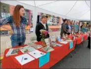  ?? LISA MITCHELL — DIGITAL FIRST MEDIA ?? Local authors showcase their books at the 2017 Author Pavilion. The 5th Annual Author Pavilion will be hosted by Firefly Bookstore during the Kutztown Block Party on April 29. New and returning local authors will share new titles and their journey to...