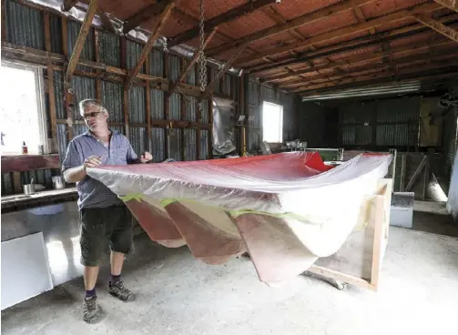  ??  ?? Another extension of the fibreglass side of boat building is this 4.2m trimaran that Max is developing as a fishing motorboat. It is made from two pieces — a hull and a deck. He says it will compete in the aluminium boat market