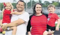  ?? COURTESY PHOTO ?? Lake Mary assistant coach Adam Donnelly is pictured with his wife, Jessica, and their two children, Olivia and Landon.