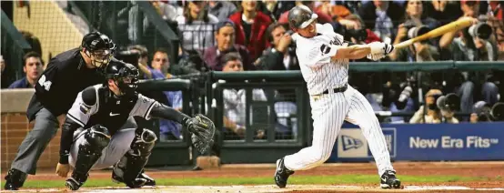  ?? Houston Chronicle file ?? Craig Biggio gets Game 3 of the 2005 World Series off to a good start for the Astros with a double to left at Minute Maid Park. The Astros were swept by the White Sox.