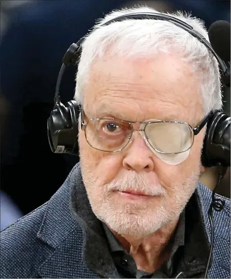  ?? MATT STONE — BOSTON HERALD ?? Veteran Celtics play-by-play man Mike Gorman wears a patch on his left eye before Wednesday’s game against the Cleveland Cavaliers at the TD Garden in Boston.