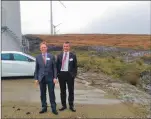  ??  ?? Alasdair Allan MSP and Angus MacNeil MP visit a wind energy project in Na h-Eileanan an Iar.