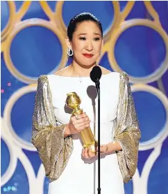  ?? PAUL DRINKWATER/NBC ?? Sandra Oh accepts the award for best actress in a drama series for her role in “Killing Eve” during the 76th Annual Golden Globe Awards at the Beverly Hilton Hotel in Beverly Hills, Calif., on Sunday.